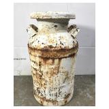Old metal milk can