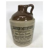 Small Racoon Mountain syrup jug
