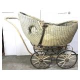 Antique wicker pram baby carriage