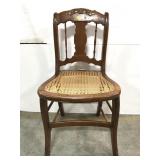Wood chair with cane seat