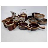 Stoneware mugs, bowls, and kettle