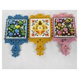 3 colorful pot holder trivets