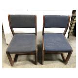 Pair of leaning chairs