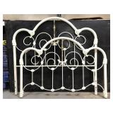 Ornate white metal headboard and foot board