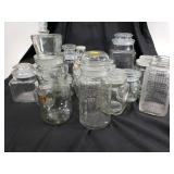Planters peanuts jars with other assorted jars