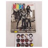 Kiss magazine and buttoms