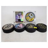 Collector hockey puck and sign puck