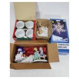 Christmas mugs with ceramic figures and lights
