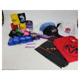 Lot of ball caps, dodge ram bandanas and cozies