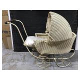 Antique wicker doll pram carriage