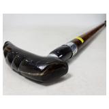 Cane with carved handle