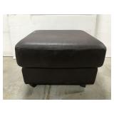 Brown leather rolling footstool