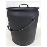 Black metal fire bucket w/ matches inside
