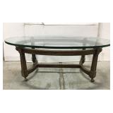 Rolling glass top coffee table