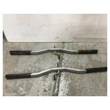 Snowmobile clamp down bars