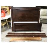 Queen size dark wood bed