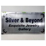 Silver & beyond metal sign