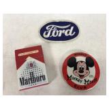 Ford patch, Mickey pin and Marlboro radio