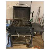 charcoal grill with adjustable tray