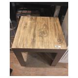 small brown table (not wood)
