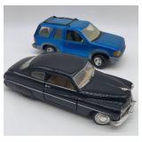 Die-cast Ford Explorer and 1949 Mercury