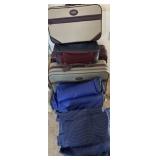 Moving Blankets and Vintage Luggage