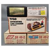 Group of HO Scale Trains and Operating Log Loader