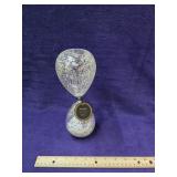 Glass hourglass made by sand times. Appears to be