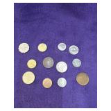 15 Foreign coins of various years valued at $2 to