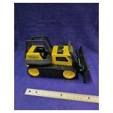 Metal and plastic Tonka tractor