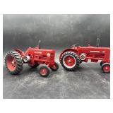 2 wood tractors- International & McCormick