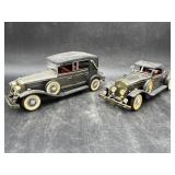 2 vibtage cars