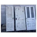 3 doors - 2 with glass knobs