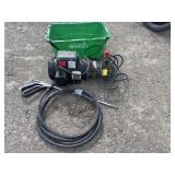 Pressure washer in green tote