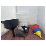 White pail with funnels