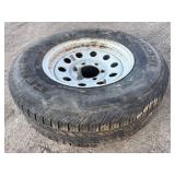 Tire with rim: P225/75R15