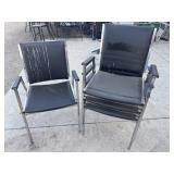 4 black stacking office chairs