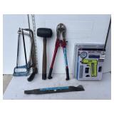 Lot: saws, mower blade, bolt cutter, mallet, pump