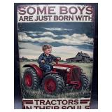 Metal sign- born w/ tractors in their souls