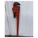 Large orange handled pipe wrench