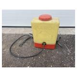 Yellow back pack sprayer