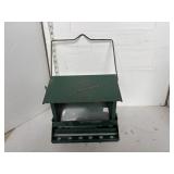 Green metal bird feeder