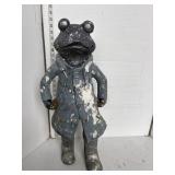 Grey frog in coat garden decor