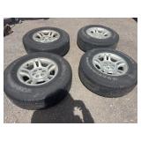 Four tires with rims: P245/75R16
