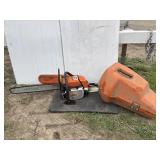 Stihl chainsaw with orange case
