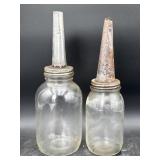 2 vintage oil bottles