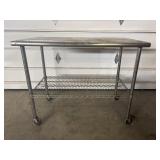 Stainless steel table / shelf on wheels