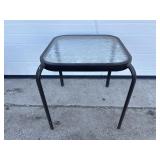 Glass top patio end table