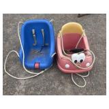 Red and blue childs swings