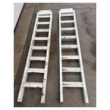 2 white heavy steel ramps